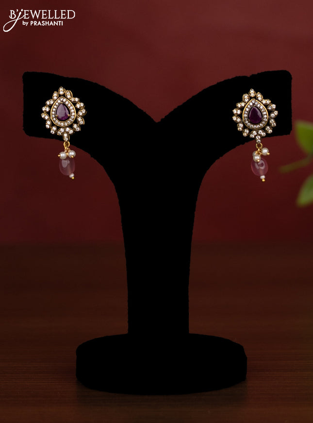 Beaded multilayer pink necklace with ruby and cz stones side pendant in victorian finish