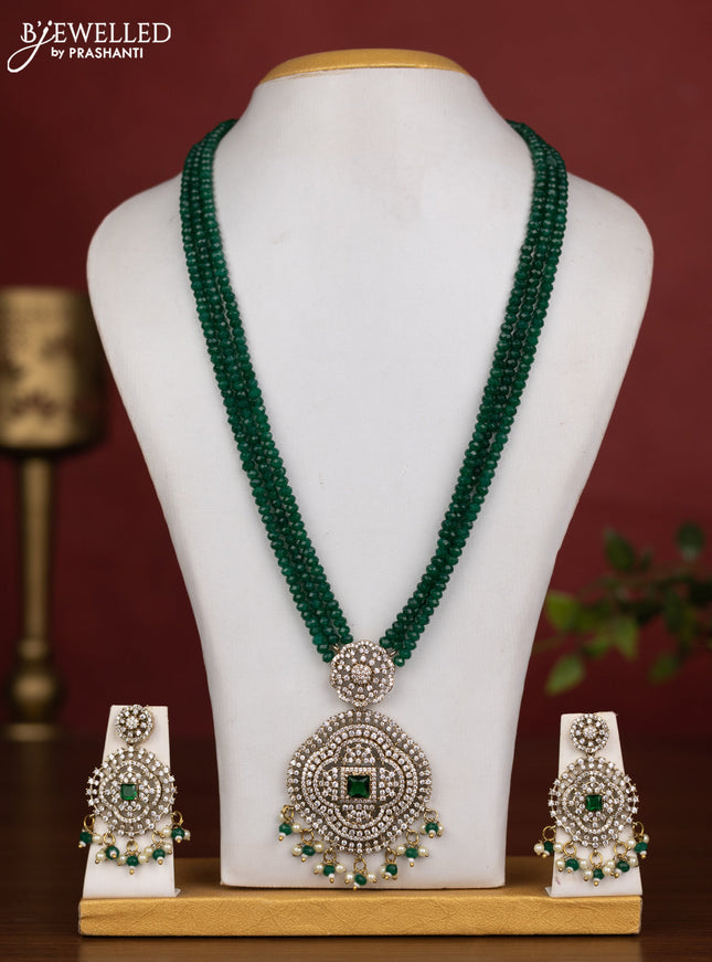Beaded triple layer green necklace with cz stones and pearl & beads hanging in victorian finish