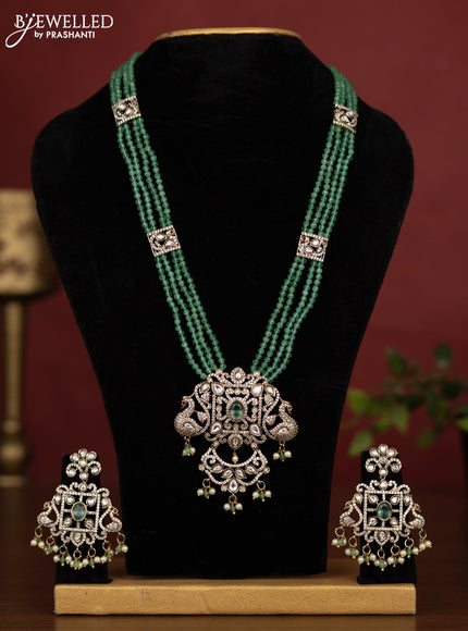 Beaded multilayer mint green necklace with kundan & cz stones and pearl & beads hanging in victorian finish