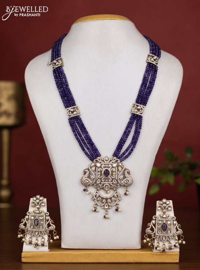 Beaded multilayer violet necklace with kundan & cz stones and pearl & beads hanging in victorian finish