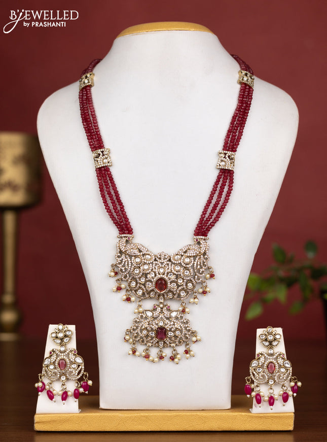 Beaded triple layer maroon necklace peacock design with ruby kundan & cz stones and pearl & beads hanging