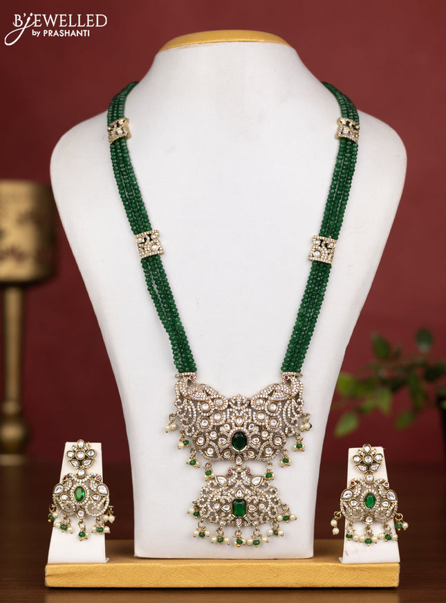Beaded triple layer green necklace peacock design with emerald kundan & cz stones and pearl & beads hanging