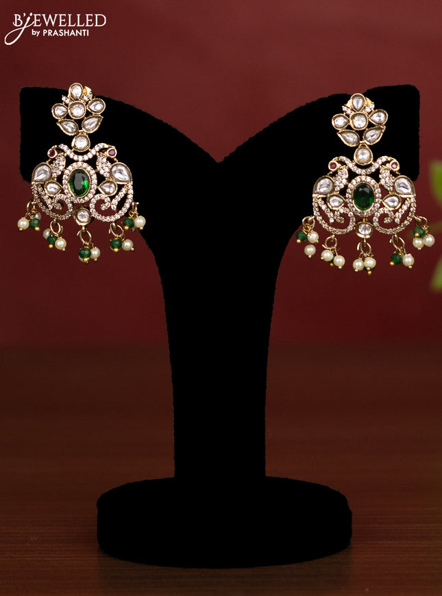 Beaded triple layer green necklace peacock design with emerald kundan & cz stones and pearl & beads hanging