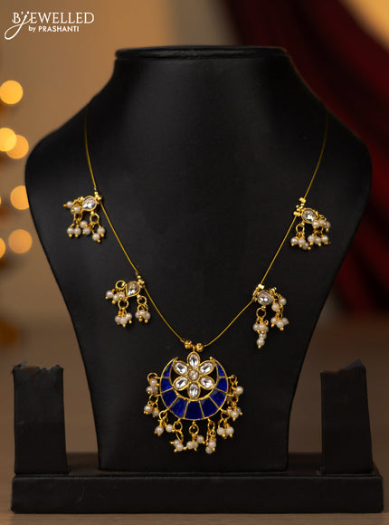 Invisible chain chandbali pendant with blue jadau kundan stones and pearl hangings without earring