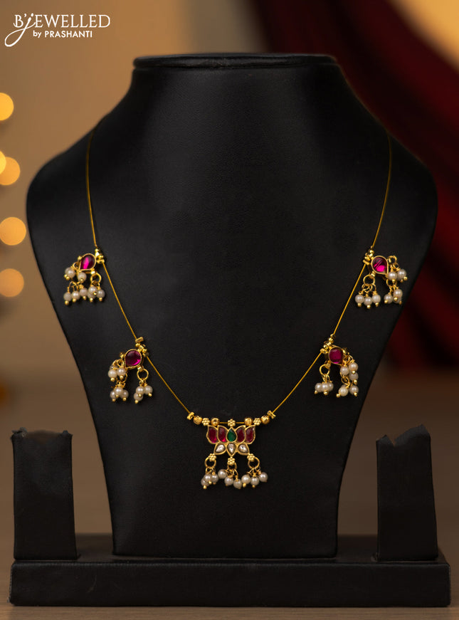 Invisible chain lotus pendant with jadau kundan stones and pearl hangings without earring