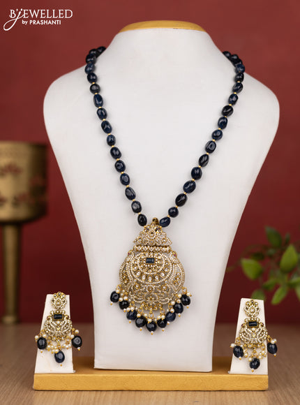 Beaded blue necklace with sapphire & cz stones and pearl & beads hanging in victorian finish