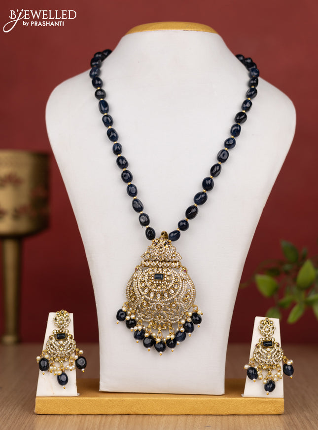 Beaded blue necklace with sapphire & cz stones and pearl & beads hanging in victorian finish