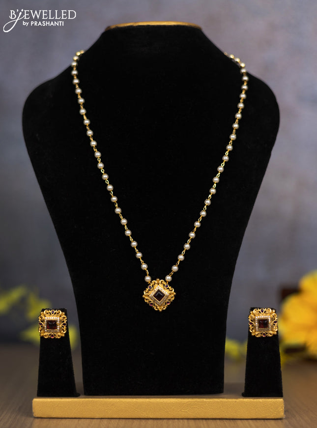 Pearl necklace with ruby and cz stones