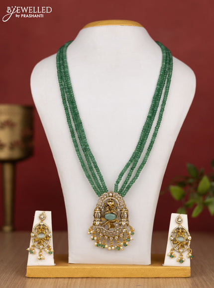 Beaded triple layer mint green haram ganesha pendant with cz stones and pearl & beads hanging in victorian finish