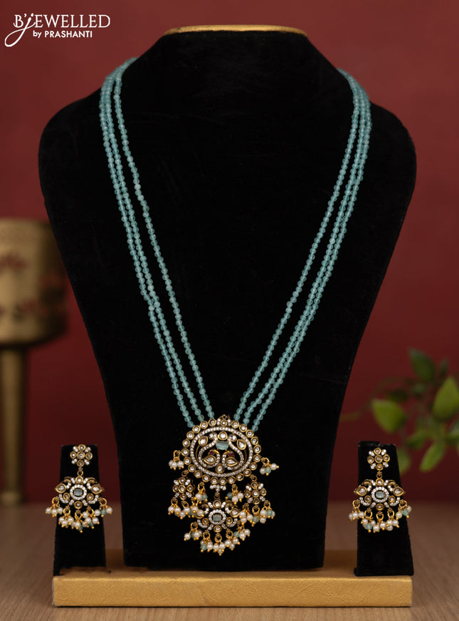 Beaded triple layer ice blue haram with kundan & cz stones and pearl & beads hanging in victorian finish