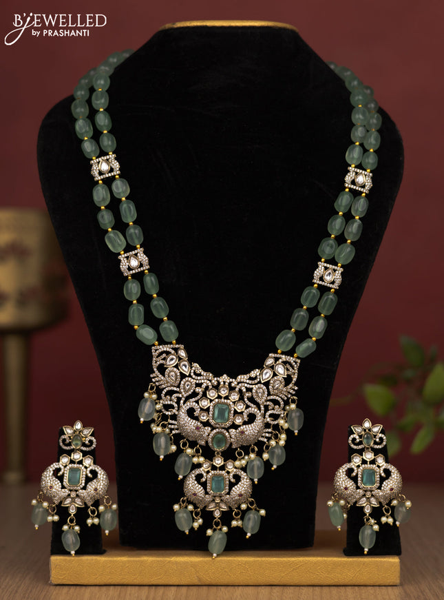 Beaded double layer mint green haram elephant design with kundan & cz stones and pearl & beads hanging in victorian finish