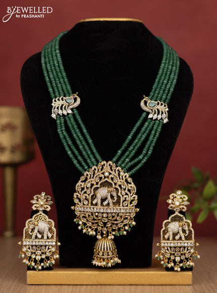Beaded multilayer mint green haram elephant pendant with cz stones and pearl & beads hanging in victorian finish