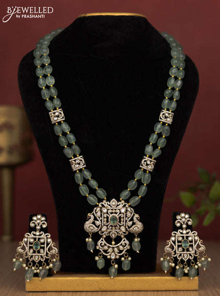 Beaded double layer mint green haram peacock design with kundan & cz stones and pearl & beads hanging in victorian finish