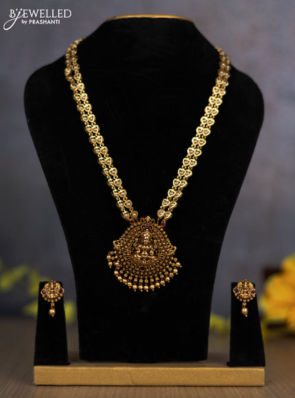 Pearl double layer haram lakshmi pendant with ruby stones and golden beads hanging