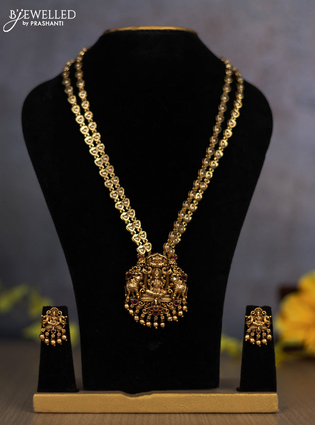 Pearl double layer haram lakshmi pendant with ruby stones and golden beads hanging