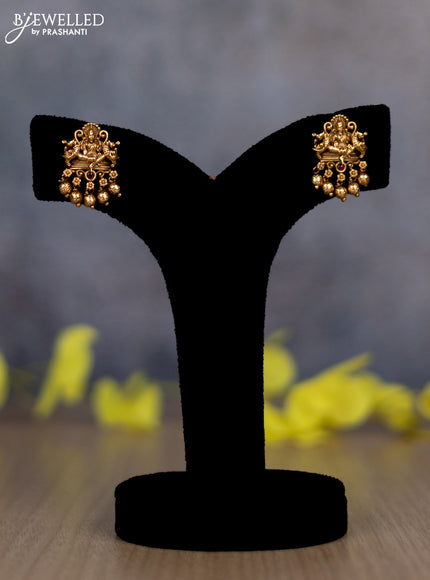 Pearl double layer haram lakshmi pendant with ruby stones and golden beads hanging