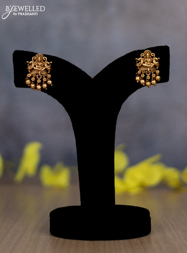 Pearl double layer haram lakshmi pendant with ruby stones and golden beads hanging