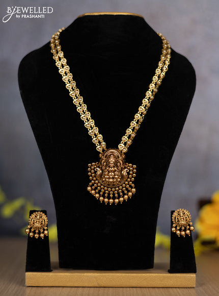 Pearl double layer haram with lakshmi pendant and golden beads hanging