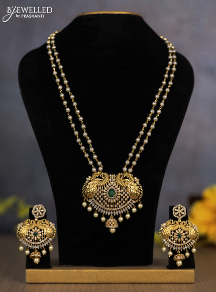 Pearl double layer haram peacock design with emerald & stones and pearl hangings