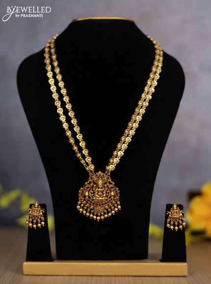 Pearl double layer haram lakshmi pendant with ruby stones and golden beads hanging