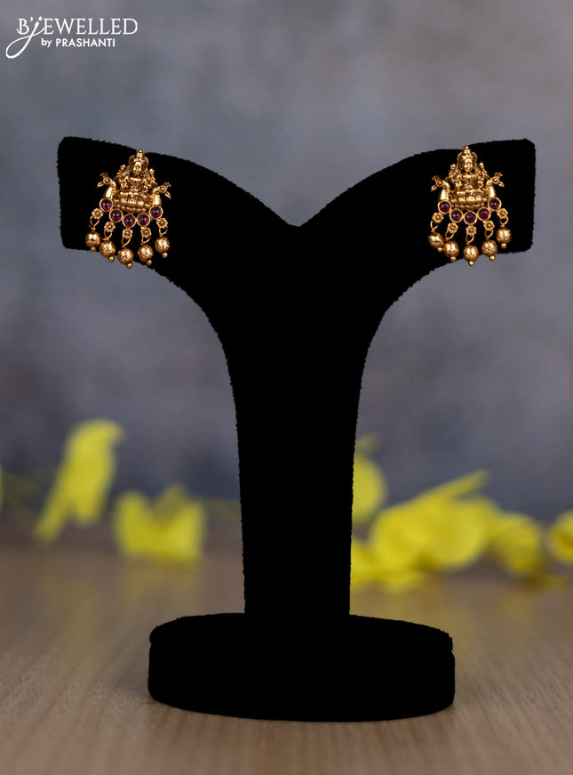 Pearl double layer haram lakshmi pendant with ruby stones and golden beads hanging