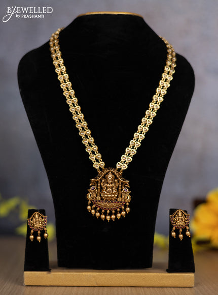 Pearl double layer haram lakshmi pendant with ruby stones and golden beads hanging