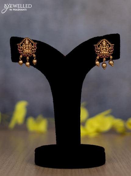 Pearl double layer haram lakshmi pendant with ruby stones and golden beads hanging