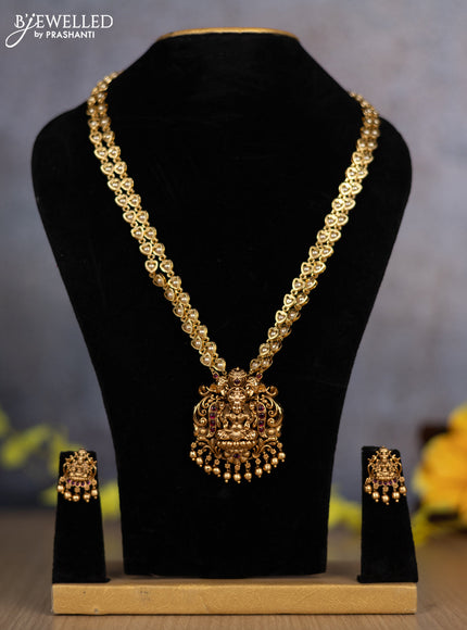 Pearl double layer haram lakshmi pendant with ruby stones and golden beads hanging