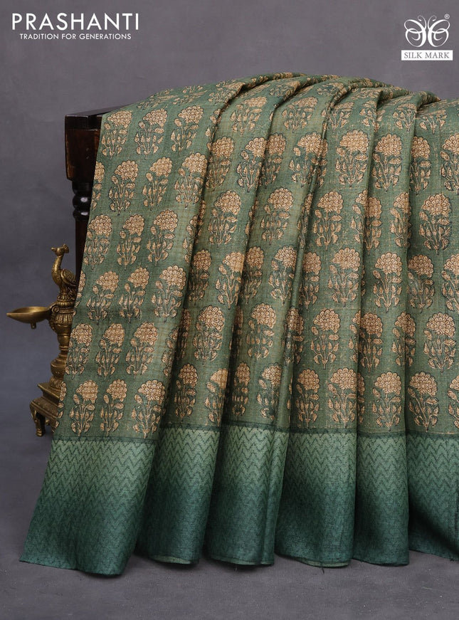 Pure tussar silk saree sap green shade with allover floral butta prints and printed border