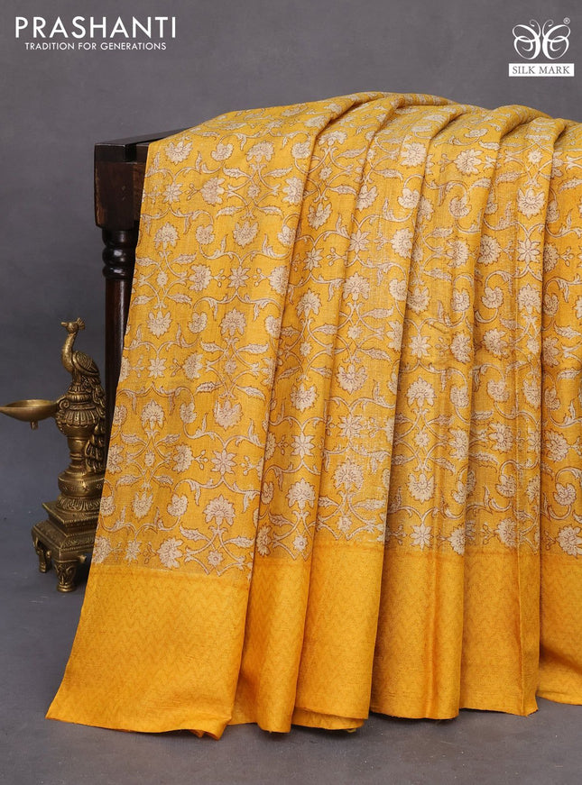 Pure tussar silk saree mustard yellow with allover floral prints and printed border