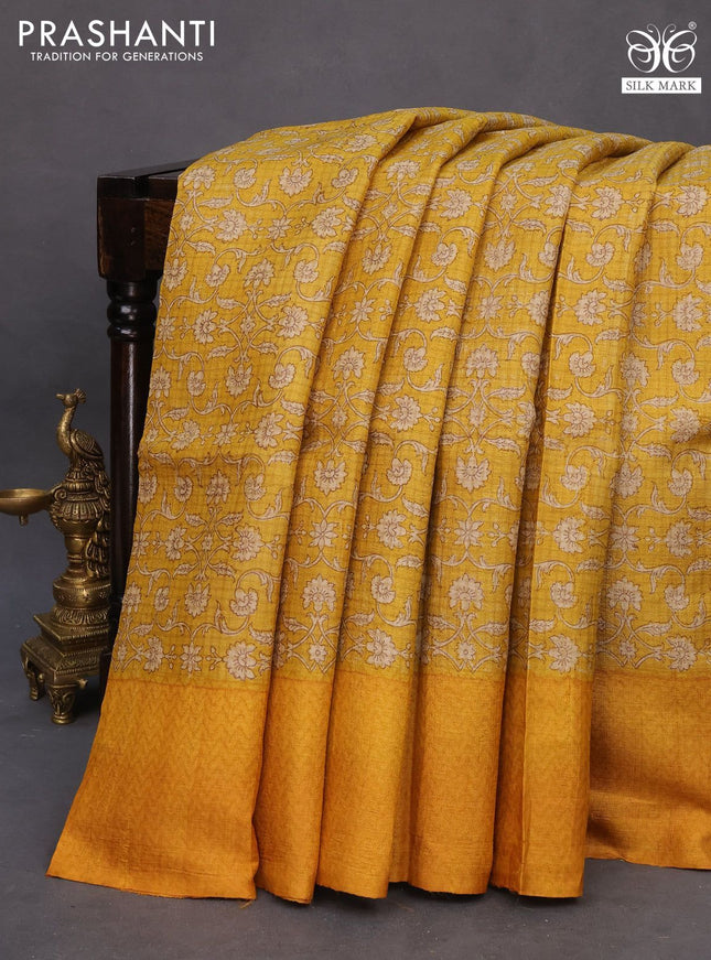 Pure tussar silk saree mustard yellow with allover floral prints and printed border