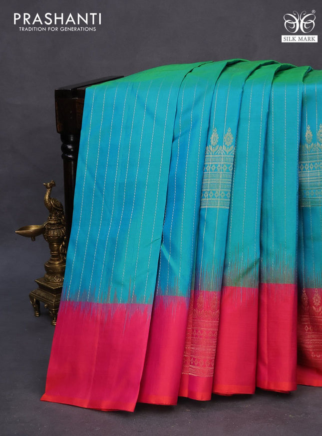Pure soft silk saree dual shade of teal blue and dual shade of pinkish orange with allover zari weaves and silver zari woven border