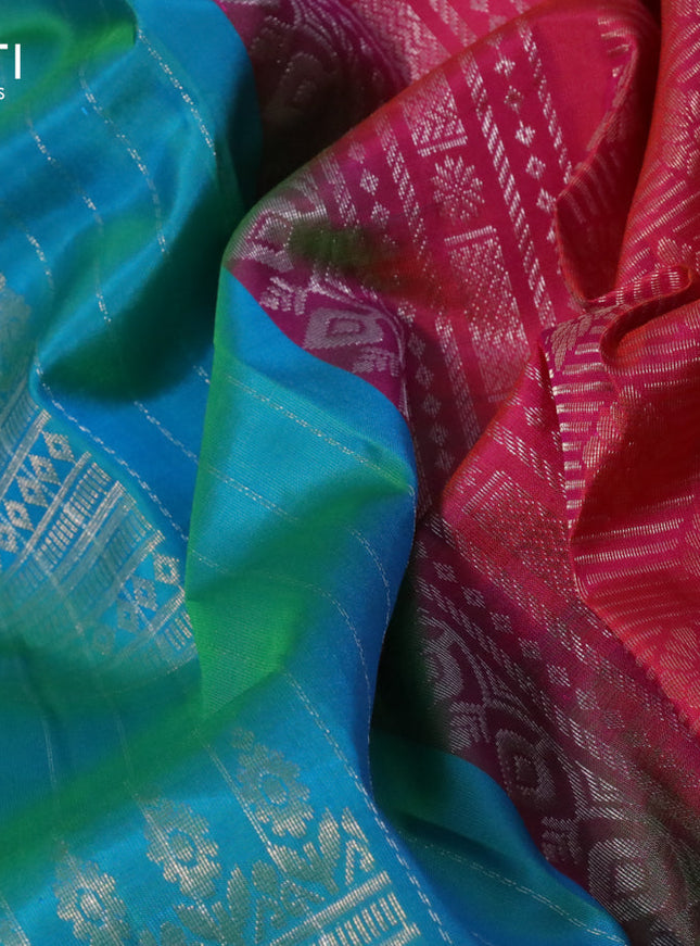 Pure soft silk saree dual shade of teal blue and dual shade of pinkish orange with allover zari weaves and silver zari woven border
