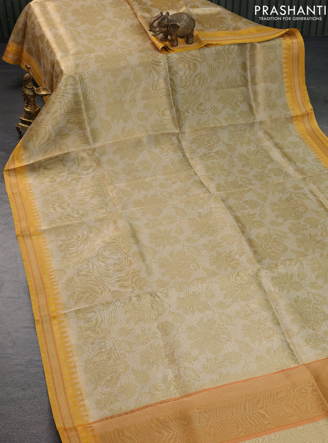 Tissue saree beige and mustard yellow with allover floral digital prints and temple design zari woven border