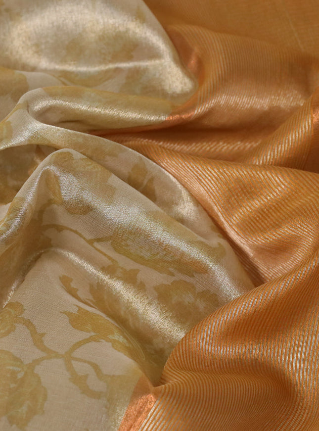 Tissue saree beige and mustard yellow with allover floral digital prints and temple design zari woven border