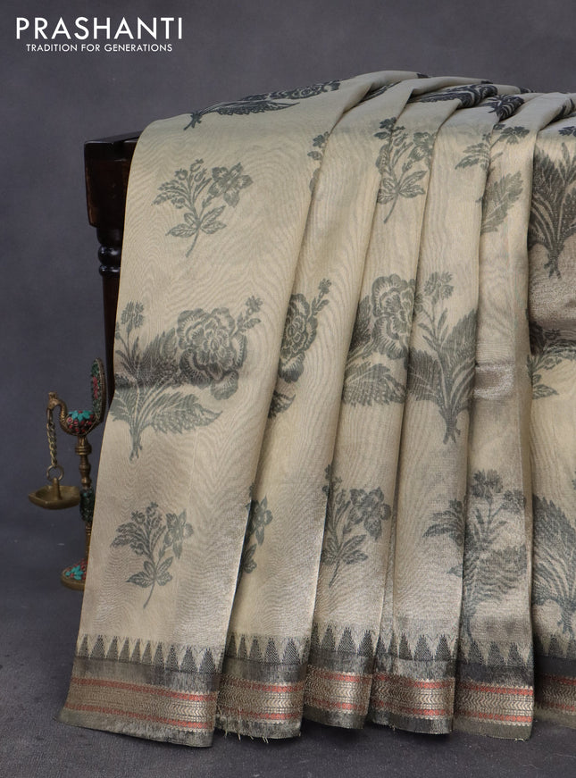 Tissue saree beige and black with allover floral digital prints and temple design zari woven border