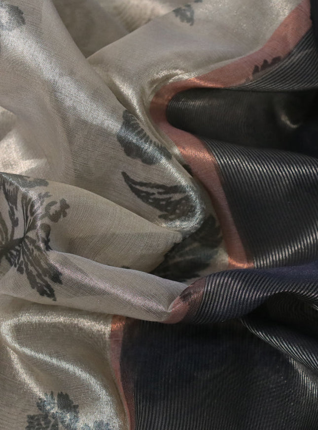 Tissue saree beige and black with allover floral digital prints and temple design zari woven border