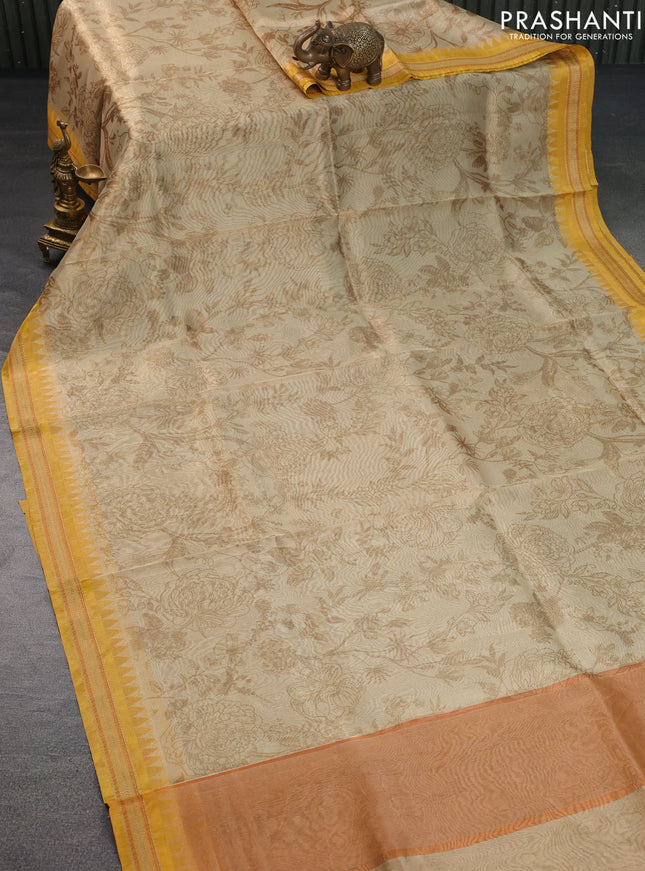 Tissue saree sandal and yellow with allover floral digital prints and temple design zari woven border