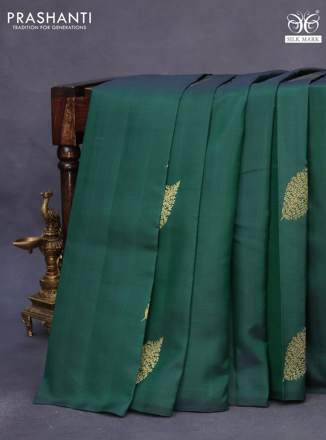 Pure kanchipuram silk saree green and dual shade of pinkish orange with zari woven buttas and piping border