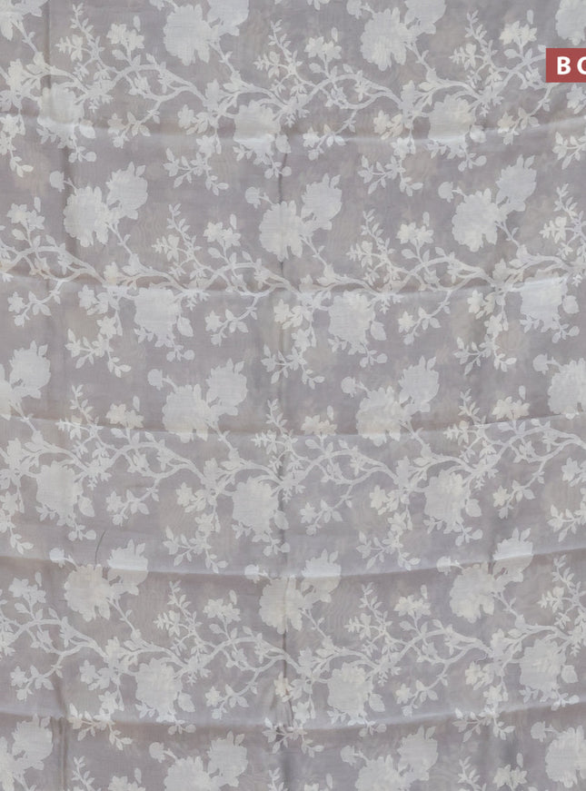 Chanderi silk cotton saree grey shade with allover floral prints and zari woven border