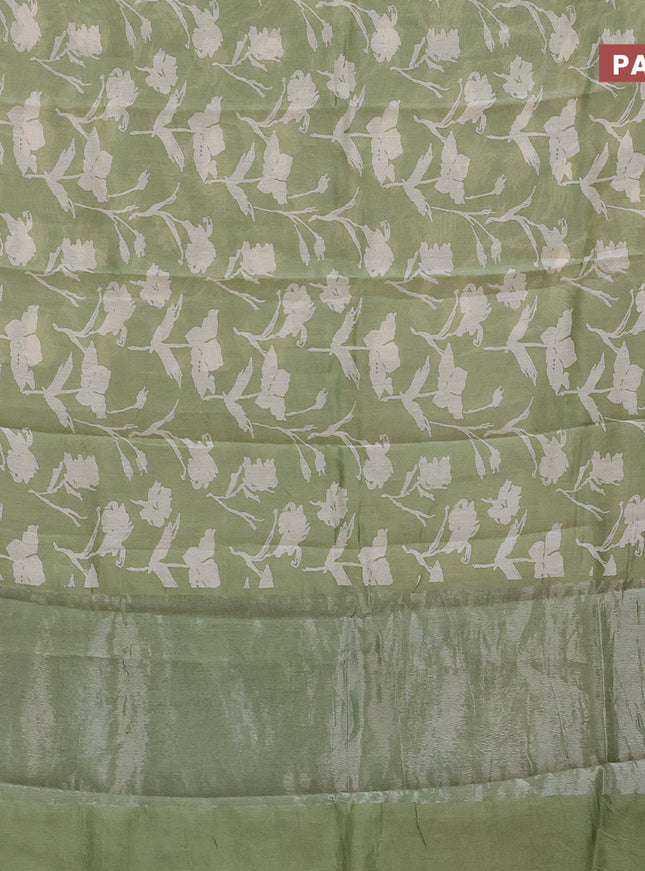 Chanderi silk cotton saree pastel green with allover floral prints and silver zari woven border