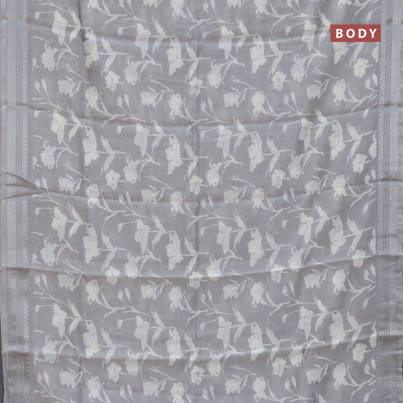 Chanderi silk cotton saree grey shade with allover floral prints and silver zari woven border