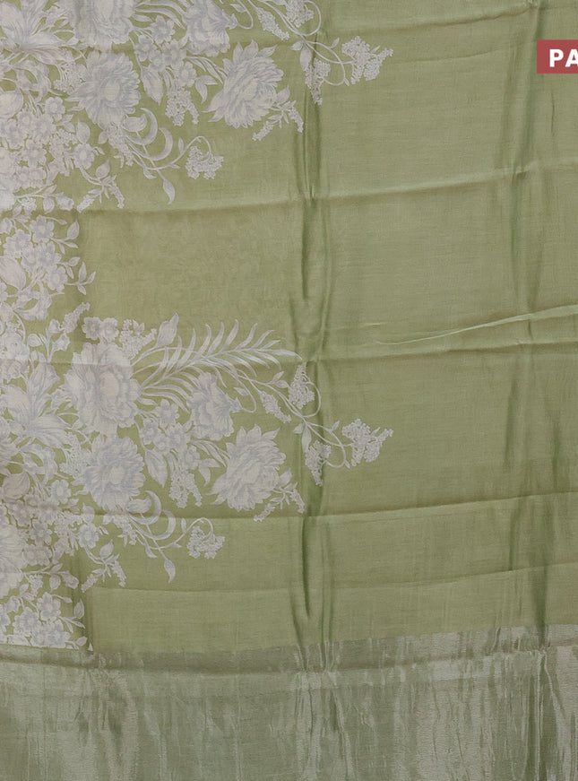 Chanderi silk cotton saree pista green with allover floral prints and zari woven border