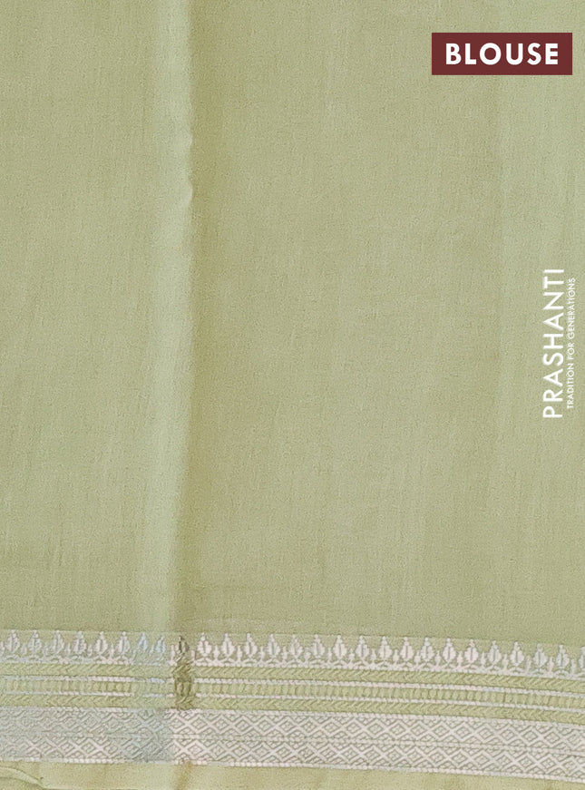 Chanderi silk cotton saree pista green with allover floral prints and zari woven border