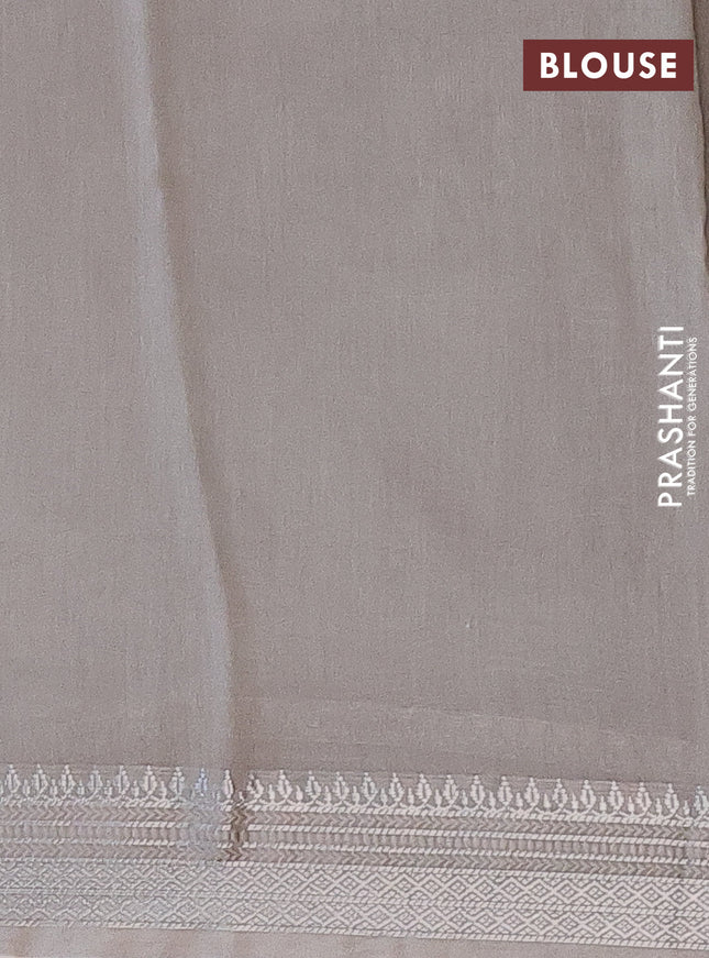 Chanderi silk cotton saree pastel grey with allover floral prints and zari woven border