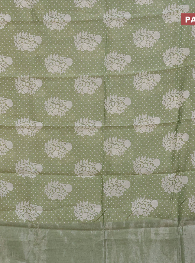 Chanderi silk cotton saree pista green shade with allover floral prints and silver zari woven border