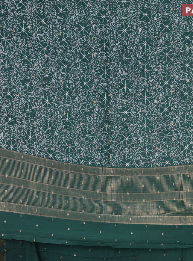 Assam silk saree dark green with allover floral prints & zari buttas and zari woven border
