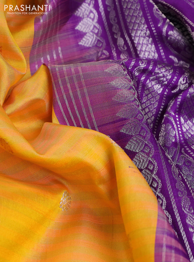 Pure gadwal silk saree dual shade of yellow and violet with allover stripe pattern & zari buttas and temple design simple border