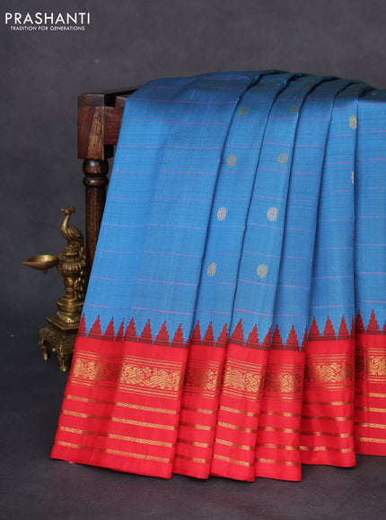 Pure gadwal silk saree cs blue and red with allover stripe pattern & zari buttas and temple design silver zari woven border