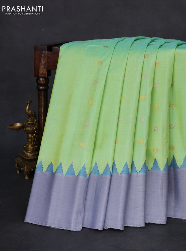 Pure gadwal silk saree green shade and grey with silver & gold zari woven floral buttas and temple design silver zari woven border